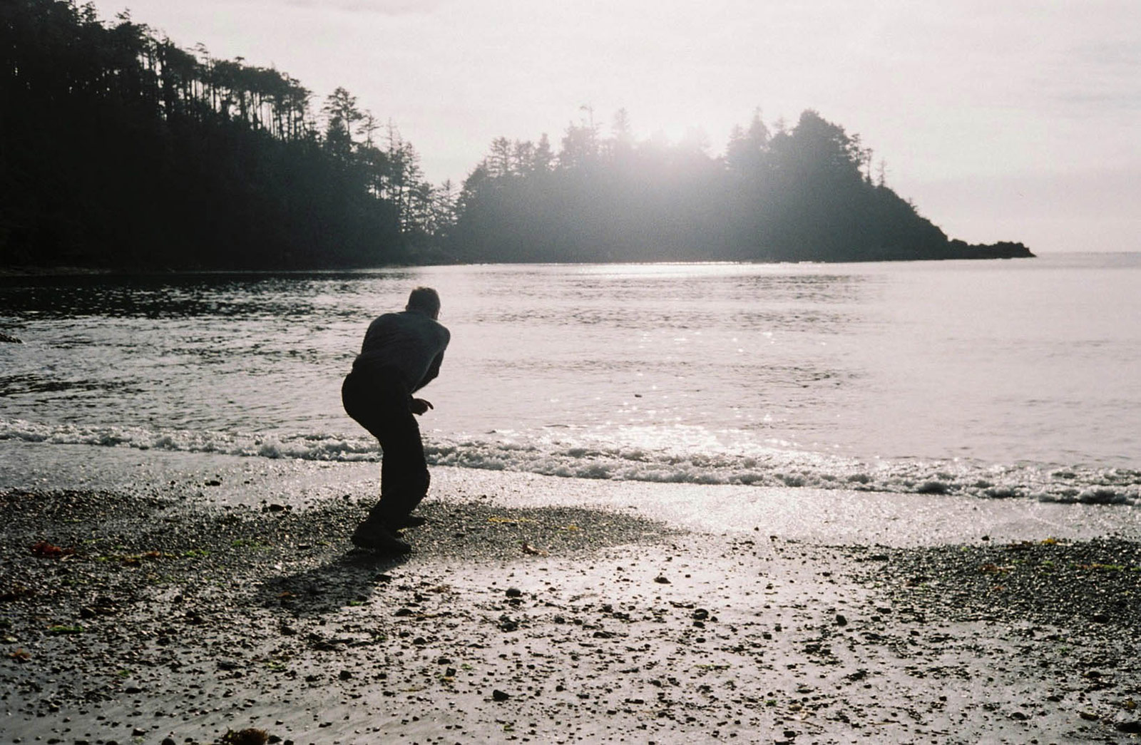 Dad skipping stones