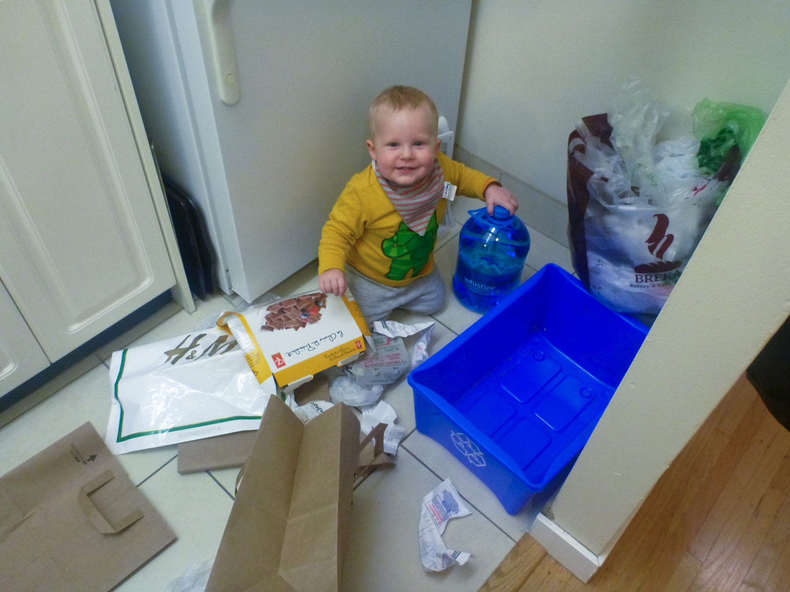 Albert cleaning up in the kitchen.