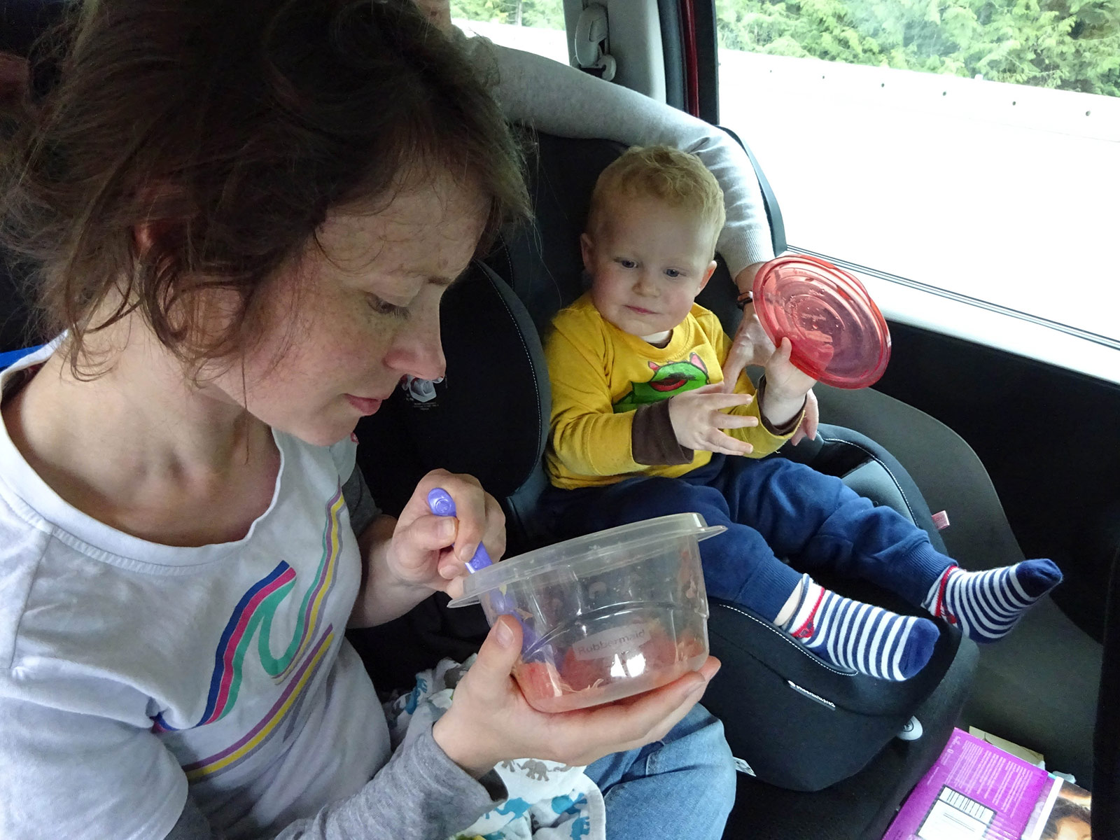 Gaga feeding Albert in the car